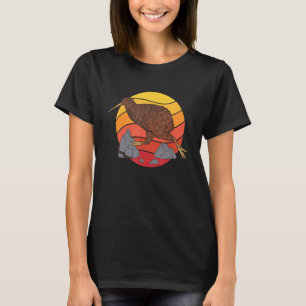 Camiseta Bird Kiwi, correndo, na Antiga Escola Neozelandesa