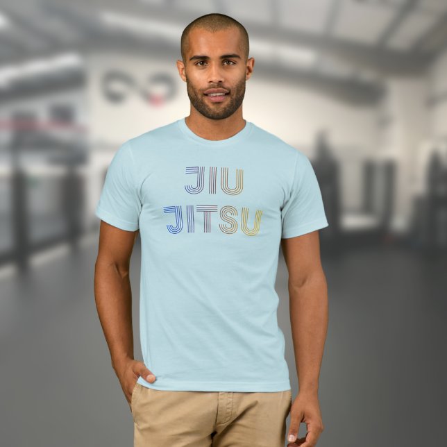 Camiseta BJJ Funky Brasil Jiu Jitsu Light Blue (Light blue Jiu Jitsu t-shirt worn by a male model in a gym)