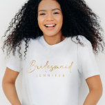 Camiseta Blachelorette de Nome Personalizado Dourado da Bri<br><div class="desc">A Camiseta Dourada Bachelorette de Nome Personalizado da Bridesmaid é uma peça moderna e minimalista para o seu partido noiva. Apresentando um elegante roteiro de ouro falso, esta camisa simples e na moda é perfeita para as festividades de solteiros e pode ser personalizada com o nome de cada dama de...</div>