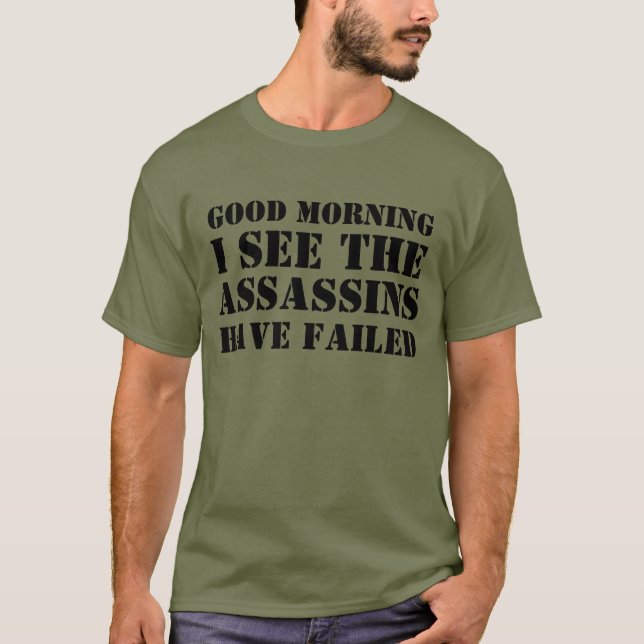 CAMISETA BOA MANHÃ, EU VEJO QUE OS ASSASSINOS FALHARAM (Frente)