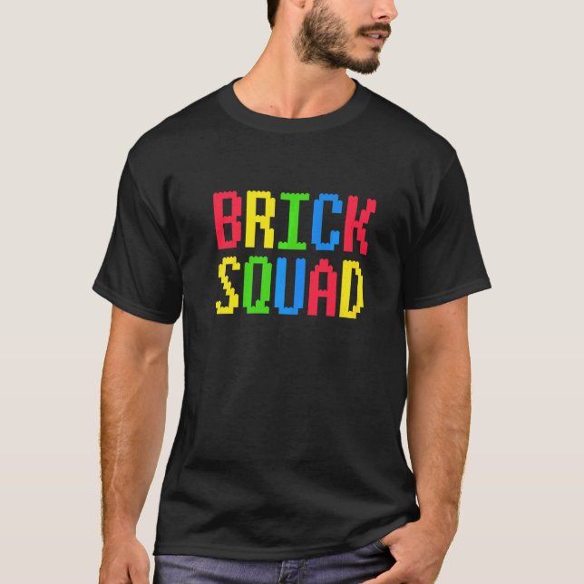 Camiseta Bricks Squad Toy Store Evento Trip Gamer Garage Sa (Frente)