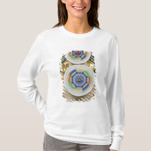 Camiseta Butão. Bolos cerimoniais feitos por monges adornam