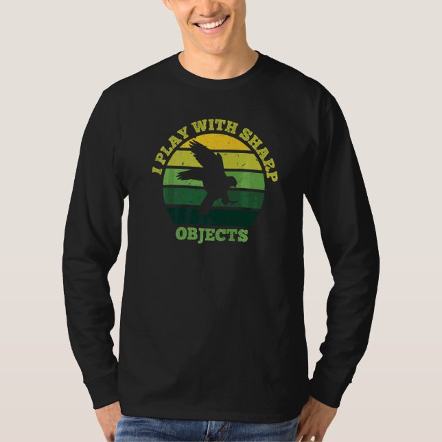 Camiseta Caça com Falcão Eu Brinco Com Objetos Cortantes Pa (Frente)