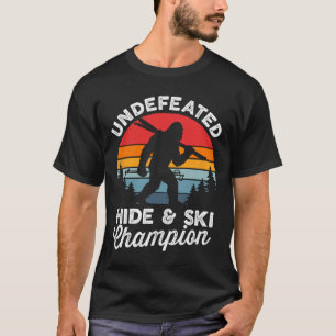 Camiseta Campeão Invicto de Esconde e Esqui Divertido Bigfo