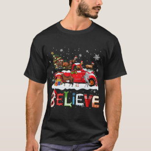 Camiseta Cavalo Andando Red Truck Árvore de Natal Acredite
