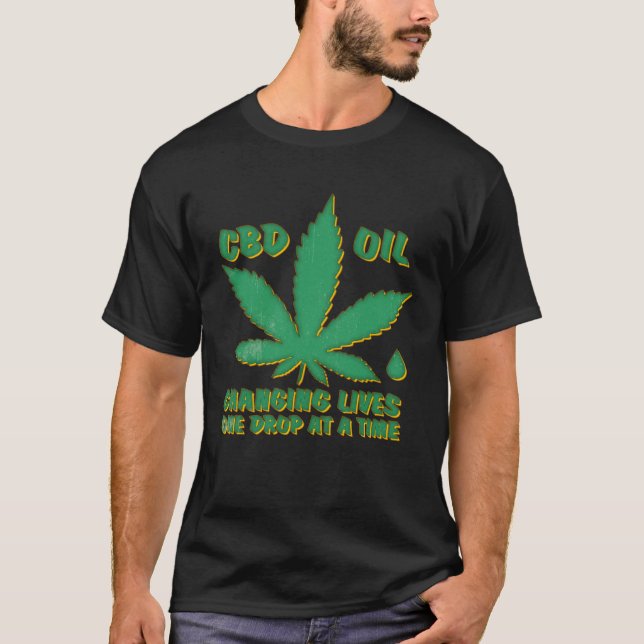 Camiseta CBD Oil Changing Lives One Drop At A Time CBD Oil (Frente)