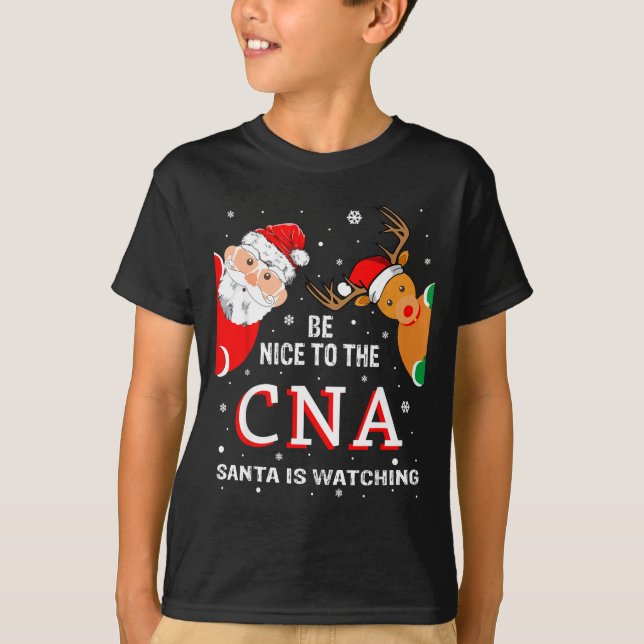 Camiseta Christmas Be Nice To The Cna Santa Is Watching  (Frente)