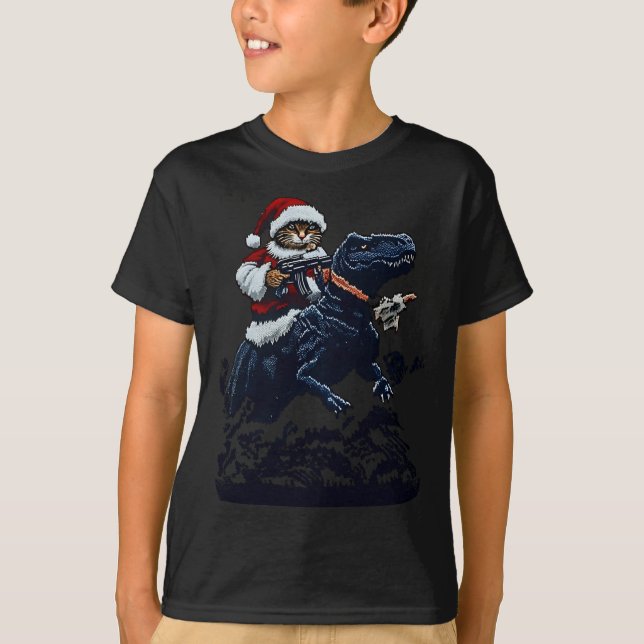 Camiseta Christmas Cat In Santa Hat Holding A Gun And Dinos (Frente)