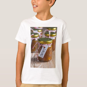Camiseta Chutney de abacaxi de cebola sobre madeira rústica
