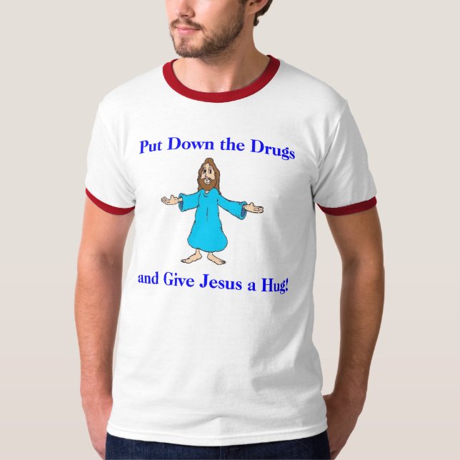 Camiseta Coloque as drogas e dê Jesus um abraço! (Frente)
