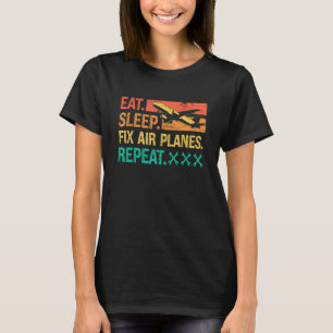 Camiseta Coma Dormir Consertar Aviões Repetir Retro Consert