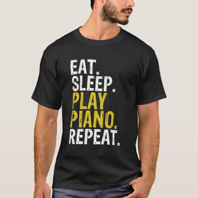 Camiseta Coma o presente de repetição do piano de repouso (Frente)