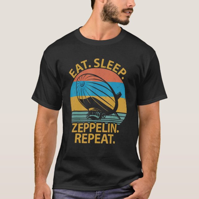 Camiseta Coma o Zeppelin Repetindo o Avião Blimp Dirigível (Frente)