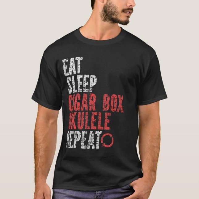 Camiseta Coma Sono Caixa de Charutos ukulele Repetir (Frente)