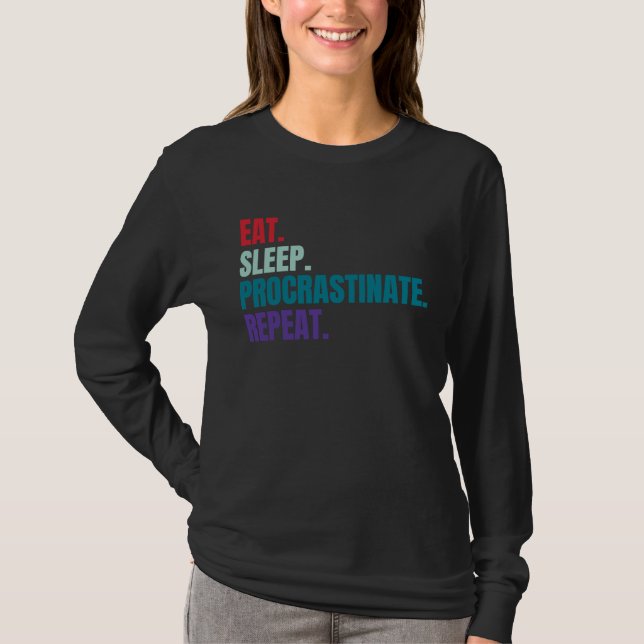 Camiseta Comer Dormir Adiar Repetir (Frente)