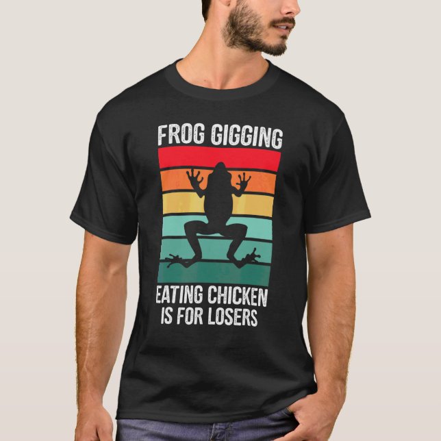 Camiseta Comer Frango Gigando Rãs é para Perdedor comer Rãs (Frente)