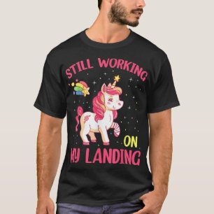 Camiseta Continuando Trabalhando Em Minha Aterrissagem Feri