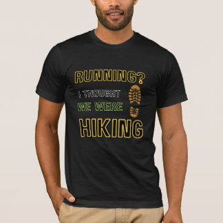CAMISETA CORRENDO? EU ACHEI QUE ESTAVAMOS FAZENDO TRILHA.– 