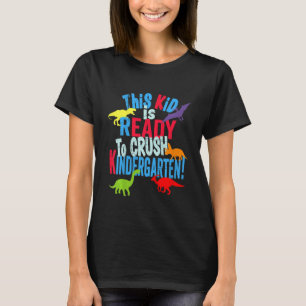 Camiseta Crianças De Volta Para A Escola O Dinossauro Está 