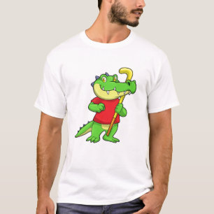Camiseta Crocodilo no Hóquei em campo com bastão de hóquei