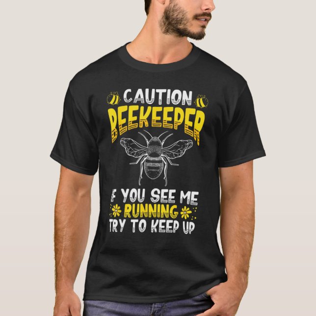 Camiseta Cuidado Com Beekeeper Se Você Me Vê Correndo Abelh (Frente)