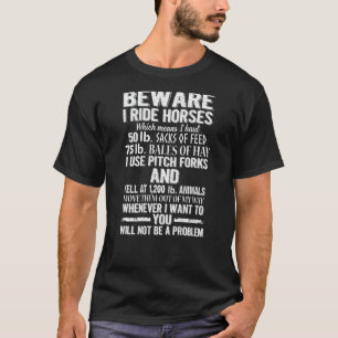 Camiseta Cuidado Eu Ando a Cavalo Você Não Será Um Problema