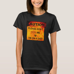 Camiseta Cuidado, por favor, não me alimente que estou em u