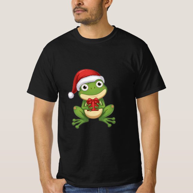 Camiseta Cute Christmas Frog with Santa Hat and Gift |  Fun (Frente)