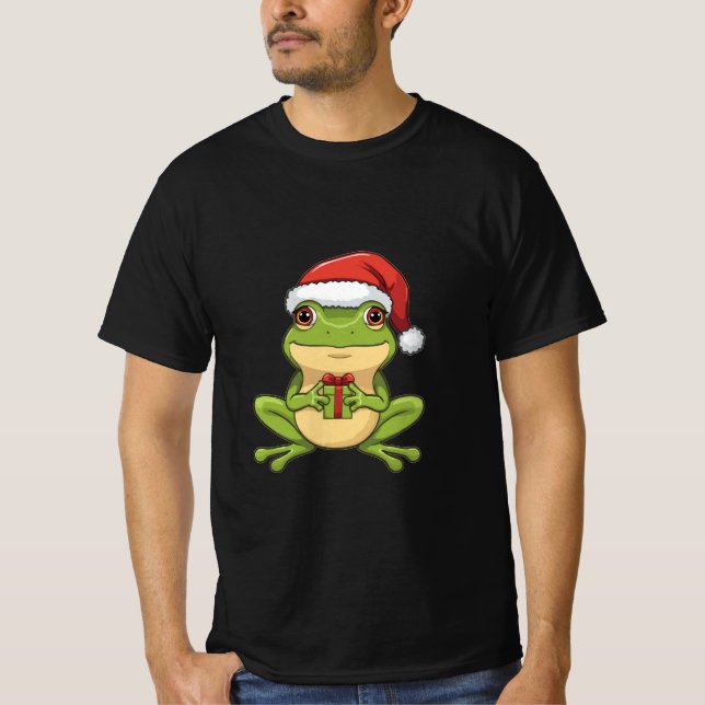 Camiseta Cute Christmas Frog with Santa Hat Holding  Gift - (Frente)