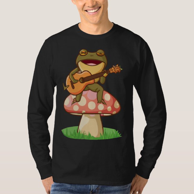 Camiseta Cute Japanese frog playing guitar banjo on a mushr (Frente)