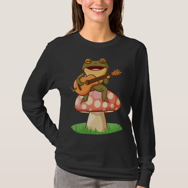 Camiseta Cute Japanese frog playing guitar banjo on a mushr (Frente)