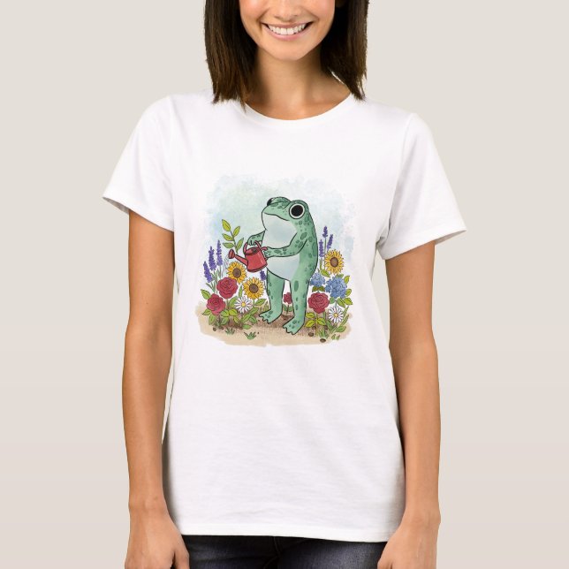 Camiseta Cute Whimsical Frog In Flower Garden Illustration (Frente)