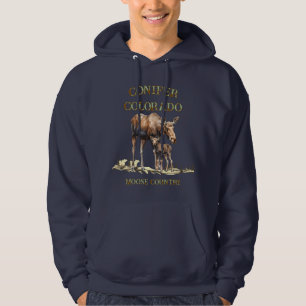 Camiseta de Mãe e Bebê Alce em Coníferas
