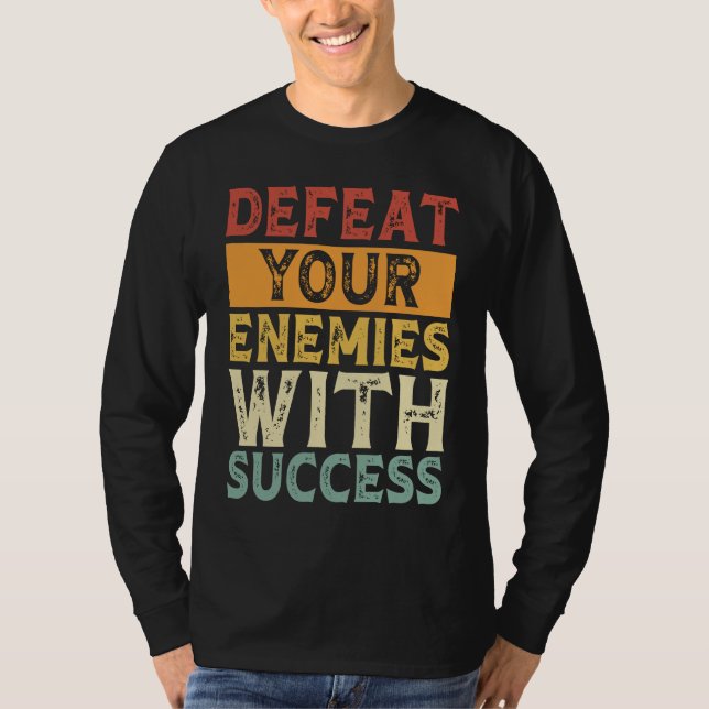 CAMISETA DEFEAT YOUR ENEMIES WITH SUCCESS MOTIVATION (Frente)
