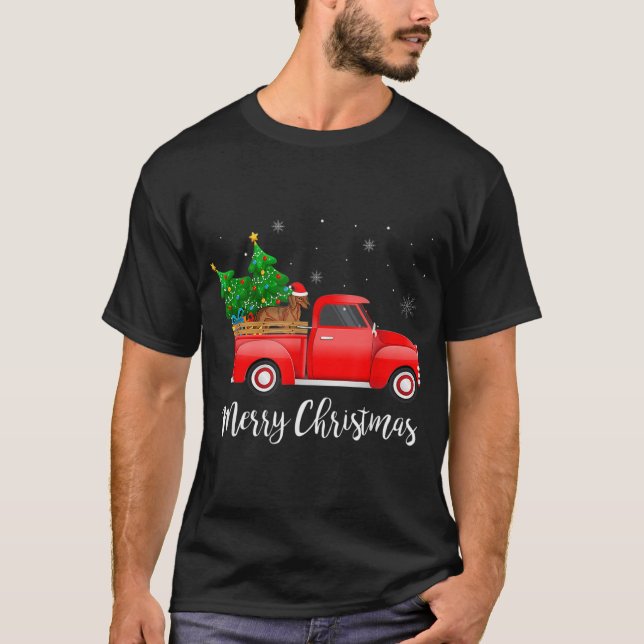 Camiseta Desordem de Natal de Caminhões Vermelhos Andando p (Frente)
