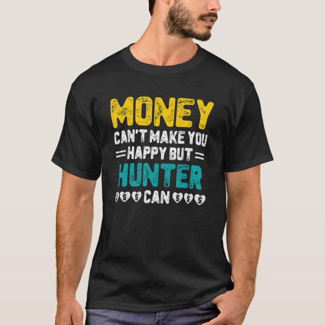 Camiseta Dinheiro não pode te fazer feliz caçador pode ser  (Frente)