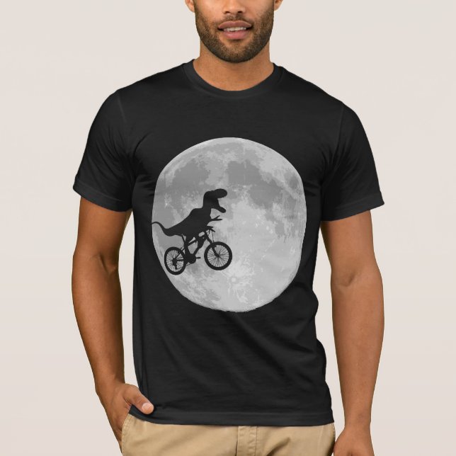 Camiseta Dinossauro em bicicleta no céu com lua (Frente)