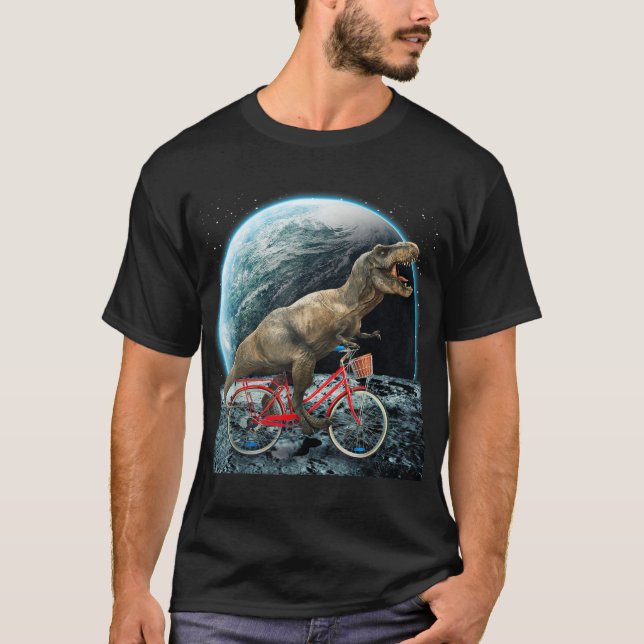 Camiseta Dinossauro Trex Na Bicicleta Espacial Na Lua Engra (Frente)