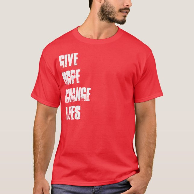 CAMISETA + DOAÇÃO DA CRUZ VERMELHA + DÊ O T DAS VIDAS DA (Frente)