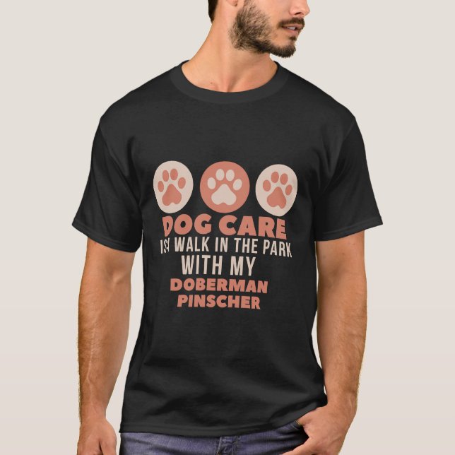 Camiseta Dog Care Is Walk In The Park With My Doberman Pins (Frente)