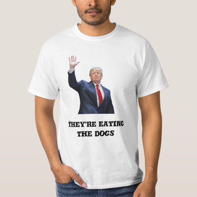 Camiseta Donald Trump T-Shirt – 'They're Eating the Dogs' (Frente)