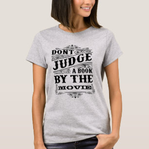 CAMISETA DONT JUDGE UM LIVRO PELO FILME