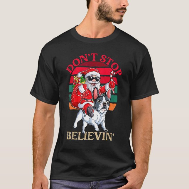 Camiseta Don't Stop Believing Santa Claus Riding French Bul (Frente)