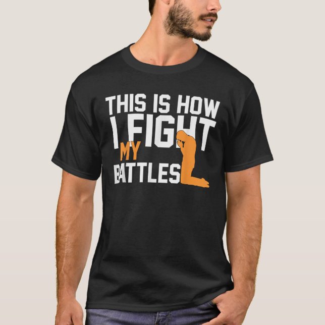 Camiseta É Assim Que Luto Contra As Minhas Batalhas, A Fé C (Frente)