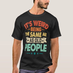Camiseta É estranho ter a mesma idade que o nascimento das