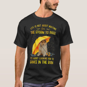 Camiseta É sobre aprender a dançar na chuva forte