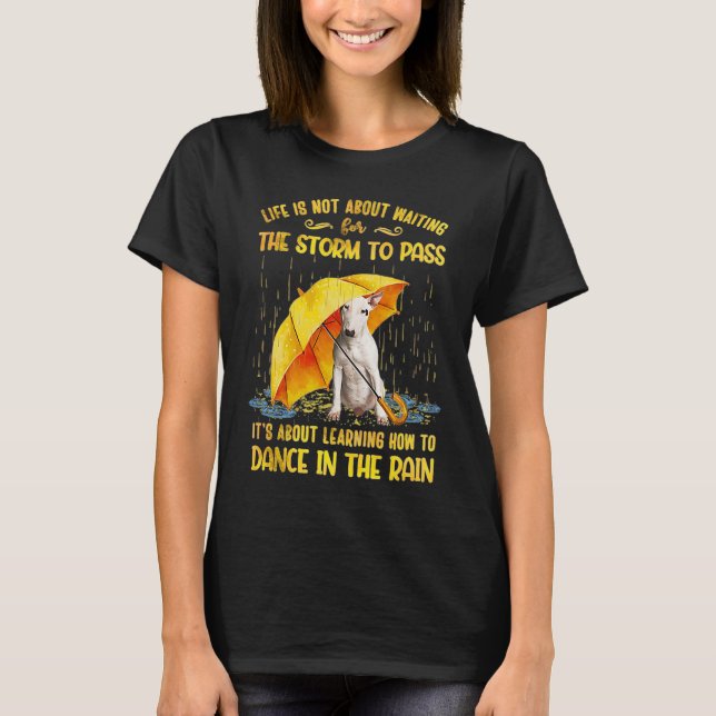 Camiseta É sobre aprender a dançar no touro da chuva (Frente)