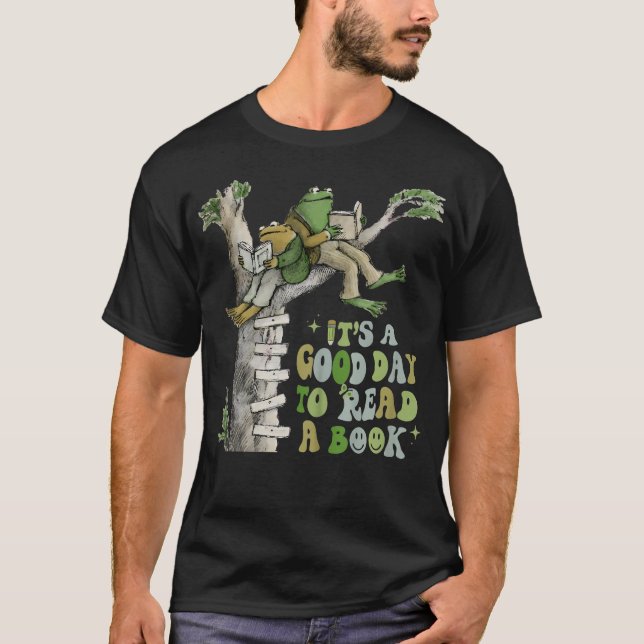 Camiseta É Um Bom Dia Ler Um Livro Que Retrai Um Sapo Engra (Frente)