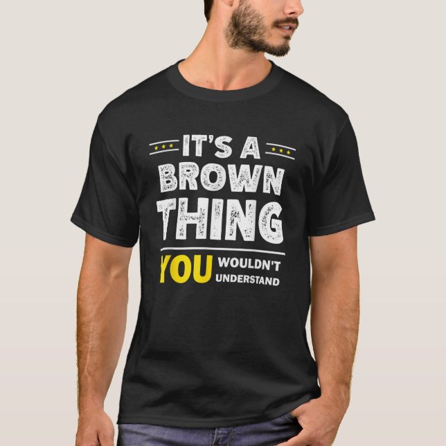 Camiseta É uma coisa marrom que você não entenderia da famí (Frente)