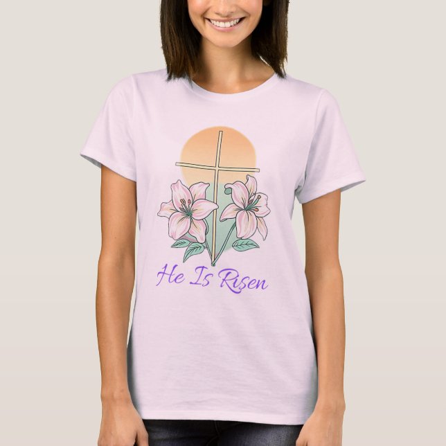 Camiseta Ele É Risen Páscoa Cristã Lily Cross (Frente)